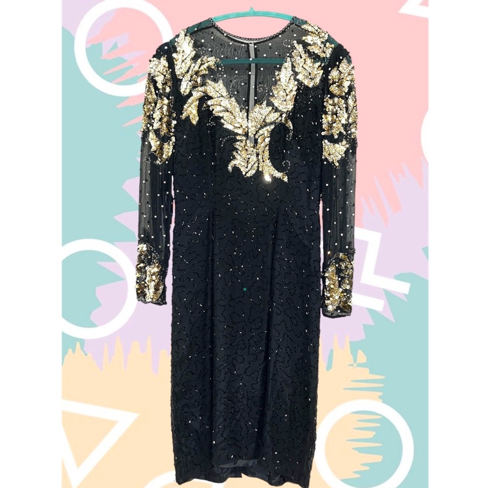 BLACK & GOLD LONG SLEEVE
EMBELLISHED DRESS
Niteline
Size 4